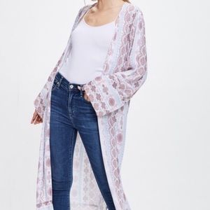 White, pale blue and mauve print duster ki…